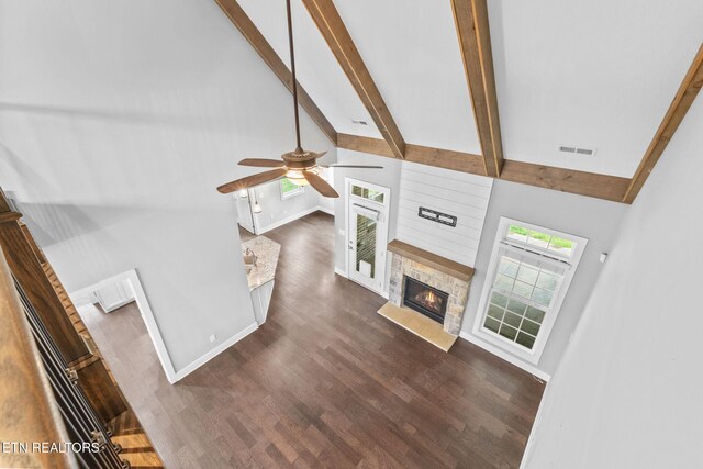 1416 Ebenezer Rd, Knoxville, TN 37922 - unfurnished living room featuring a ceiling fan, visible vents, dark wood finished floors, beam ceiling, and high vaulted ceiling