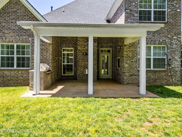 1416 Ebenezer Rd, Knoxville, TN 37922 - exterior space featuring brick siding, a shingled roof, and a yard