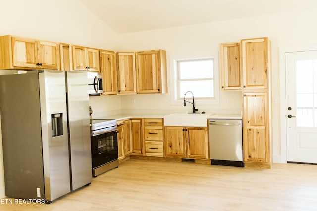 162 Wilderness Dr, New Tazewell, TN 37825 - kitchen with light brown cabinets, a sink, light wood-type flooring, stainless steel appliances, and light countertops
