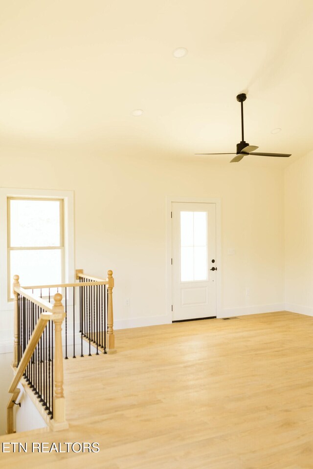 162 Wilderness Dr, New Tazewell, TN 37825 - spare room with light wood-style flooring, a ceiling fan, and baseboards