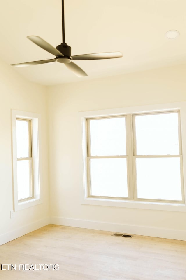 162 Wilderness Dr, New Tazewell, TN 37825 - empty room with visible vents, baseboards, a ceiling fan, and wood finished floors