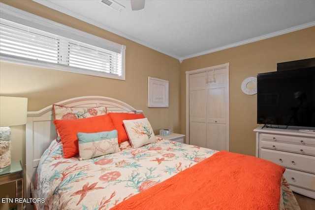 470 Deerfield Lndg Unit 5, Lafollette, TN 37766 - bedroom featuring a closet, visible vents, a ceiling fan, and ornamental molding