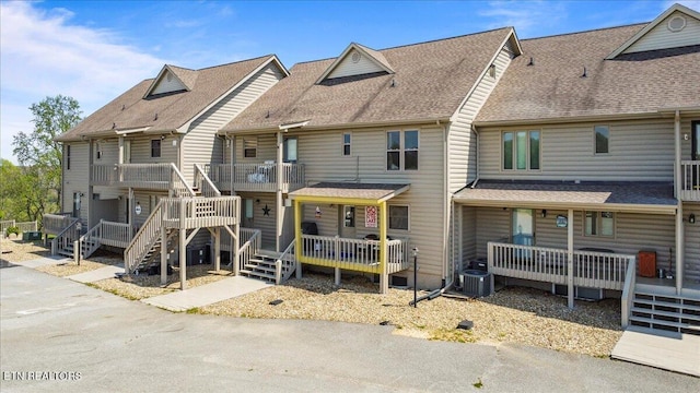 470 Deerfield Lndg Unit 5, Lafollette, TN 37766 - exterior space with roof with shingles, stairs, and central AC