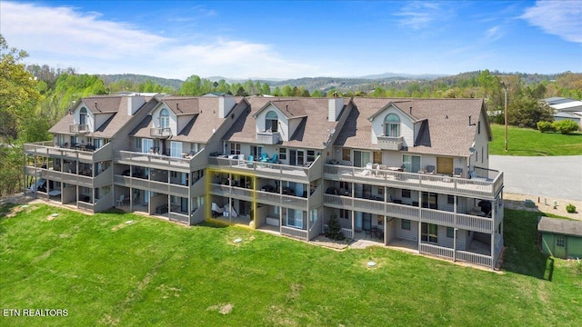 470 Deerfield Lndg Unit 5, Lafollette, TN 37766 - exterior space with a lawn, a chimney, and a mountain view