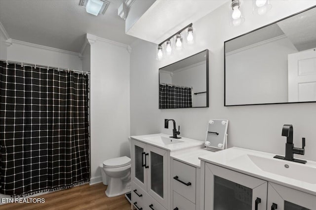 470 Deerfield Lndg Unit 5, Lafollette, TN 37766 - full bath featuring toilet, visible vents, wood finished floors, vanity, and ornamental molding