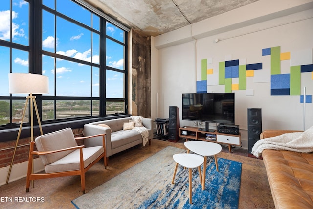 living room featuring concrete floors