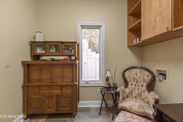 sitting room featuring baseboards