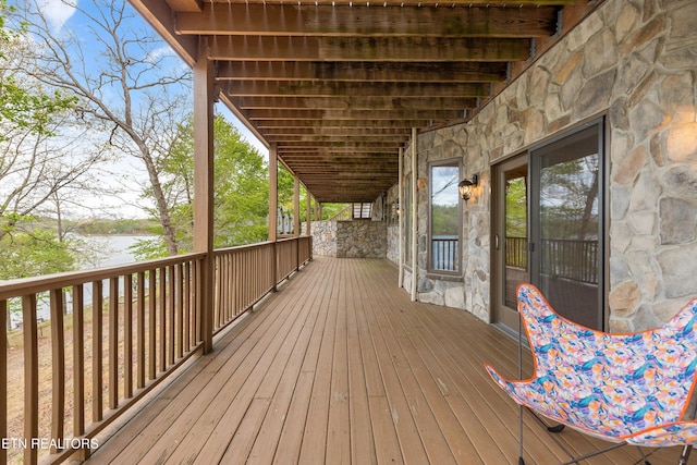 deck featuring a water view