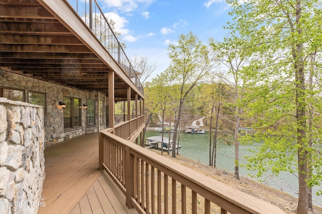deck featuring a water view