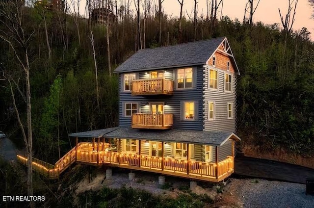 914 Crooked Ridge Rd, Gatlinburg, TN 37738 - rear view of house featuring a wooded view and a balcony