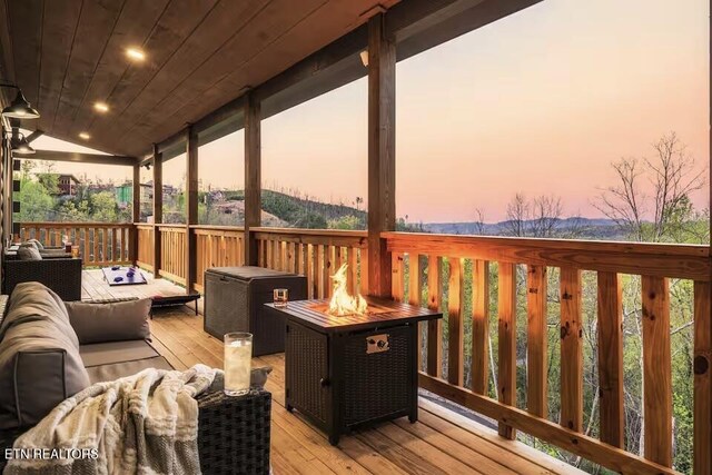914 Crooked Ridge Rd, Gatlinburg, TN 37738 - wooden deck featuring an outdoor living space with a fire pit