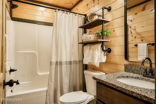 914 Crooked Ridge Rd, Gatlinburg, TN 37738 - bathroom with toilet, vanity, wood walls, and shower / bath combination with curtain