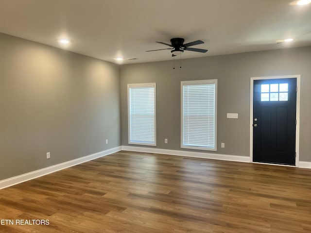 entrance foyer with ceiling fan, baseboards, wood finished floors, and recessed lighting