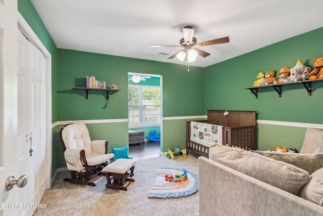 bedroom with visible vents, ceiling fan, carpet floors, baseboards, and a closet