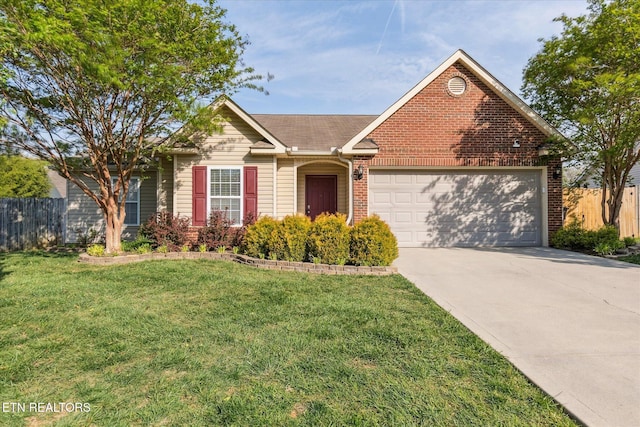 ranch-style home with fence, a front lawn, concrete driveway, and an attached garage