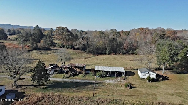 birds eye view of property featuring a rural view