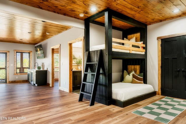 bedroom featuring baseboards, recessed lighting, wooden ceiling, and wood finished floors