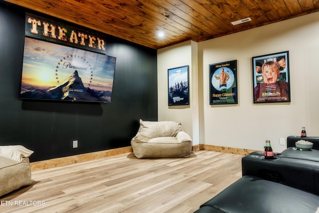 interior space featuring wood ceiling, baseboards, visible vents, and wood finished floors