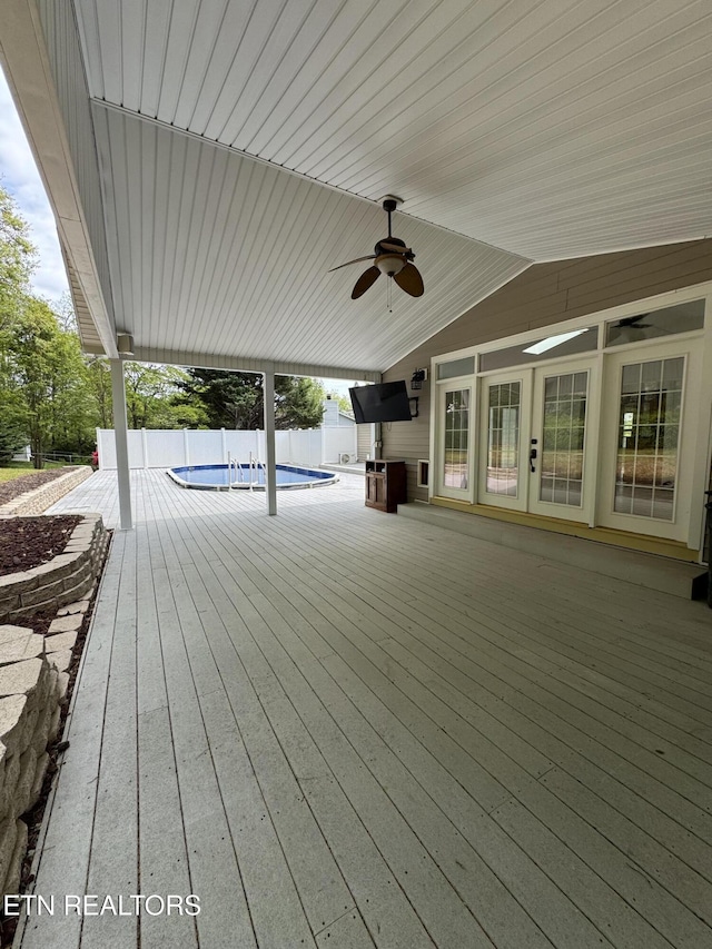 11709 Black Powder Dr, Knoxville, TN 37934 - deck featuring fence, a ceiling fan, and a fenced in pool