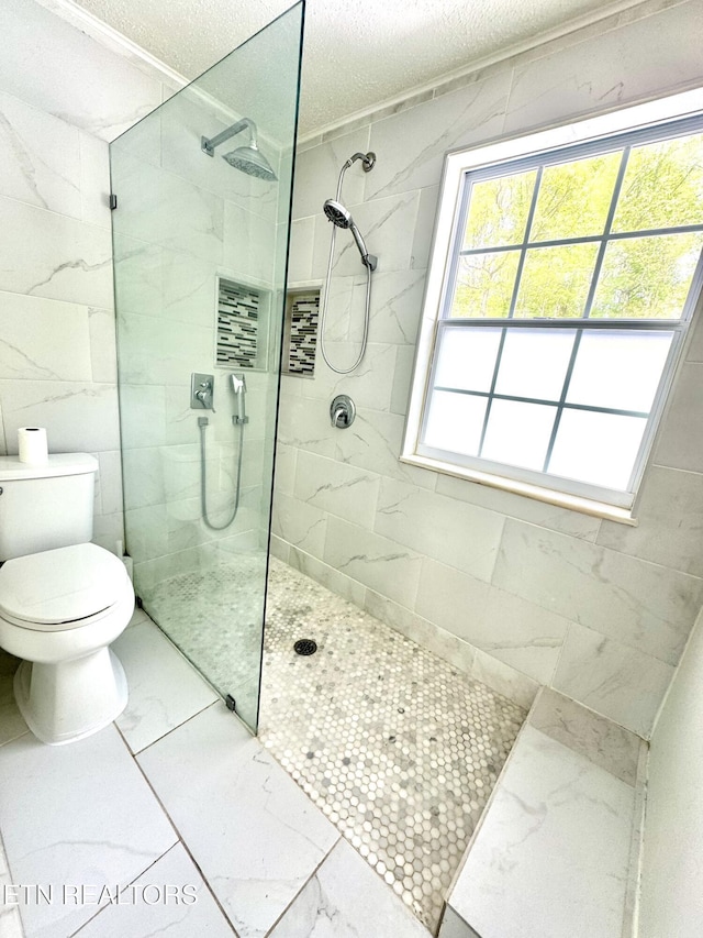 11709 Black Powder Dr, Knoxville, TN 37934 - bathroom featuring walk in shower, a textured ceiling, marble finish floor, and toilet