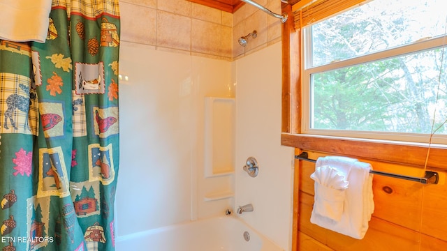 full bathroom with shower / bath combination with curtain