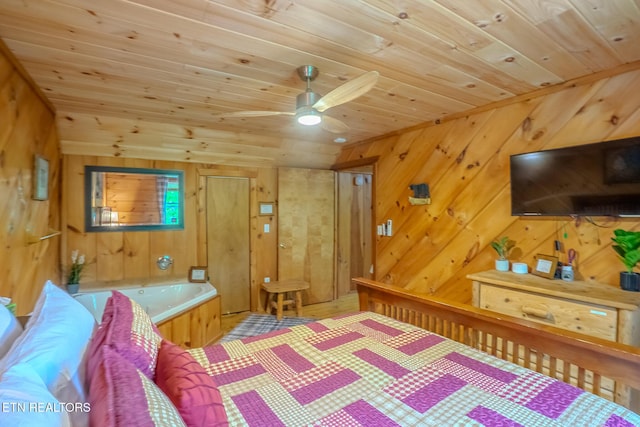 bedroom with wood walls, wood finished floors, and wooden ceiling