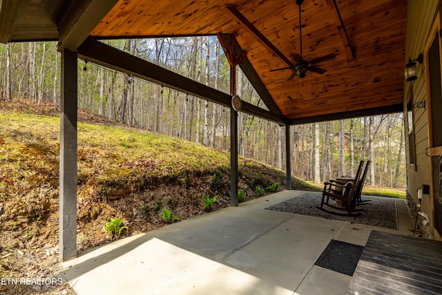 view of patio featuring ceiling fan