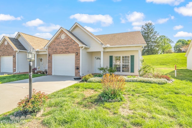 300 Willington Pl, Loudon, TN 37774 - view of front of property featuring driveway, a garage, brick siding, a shingled roof, and a front yard