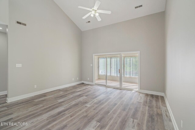 300 Willington Pl, Loudon, TN 37774 - spare room featuring baseboards, visible vents, high vaulted ceiling, and ceiling fan