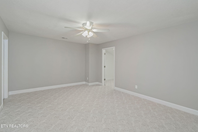 300 Willington Pl, Loudon, TN 37774 - spare room featuring visible vents, a ceiling fan, baseboards, and light colored carpet