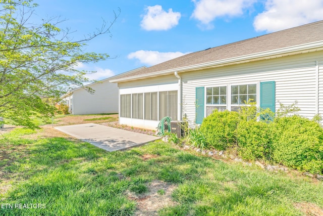300 Willington Pl, Loudon, TN 37774 - rear view of house featuring a lawn, a sunroom, and a patio area