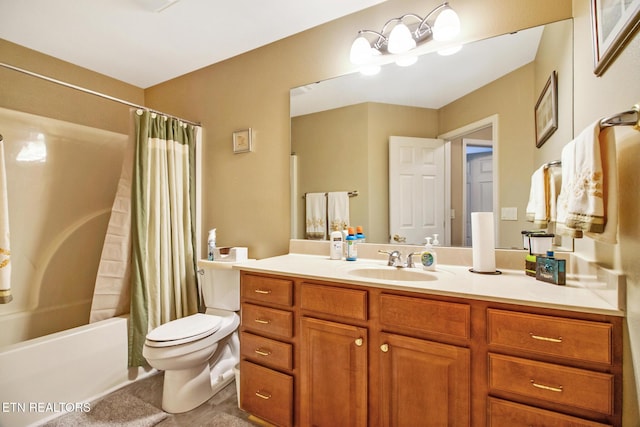 bathroom featuring shower / tub combo with curtain, toilet, and vanity