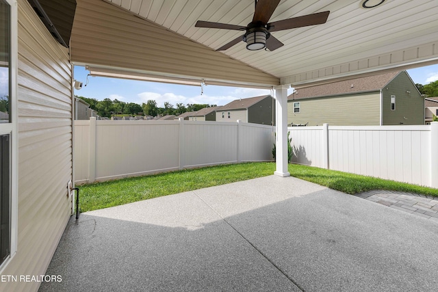 view of patio featuring a fenced backyard and a ceiling fan