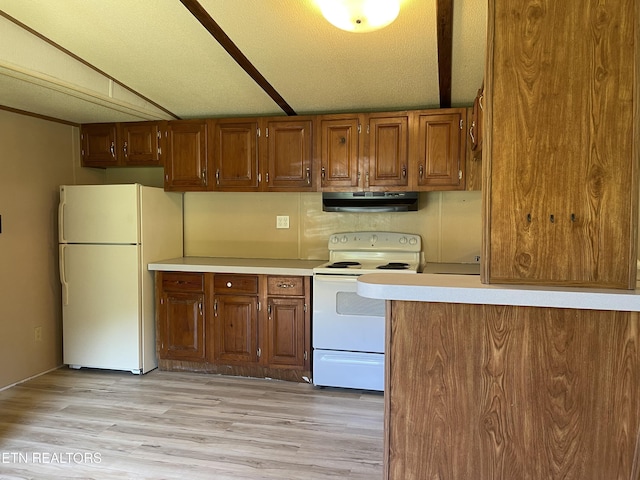 kitchen featuring light wood finished floors, white appliances, brown cabinets, light countertops, and under cabinet range hood