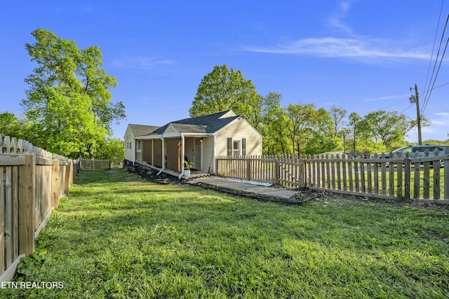 view of yard featuring a fenced backyard