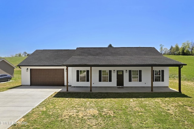252 Old Middlesboro Hwy, Lafollette, TN 37766 - view of front facade featuring an attached garage, a porch, a front yard, and concrete driveway