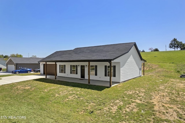 252 Old Middlesboro Hwy, Lafollette, TN 37766 - view of front of home with driveway, a front yard, covered porch, and a garage