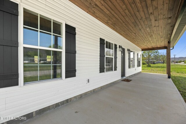 252 Old Middlesboro Hwy, Lafollette, TN 37766 - view of patio / terrace with covered porch