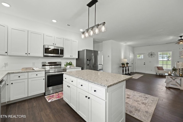 252 Old Middlesboro Hwy, Lafollette, TN 37766 - kitchen with stainless steel appliances, open floor plan, recessed lighting, and dark wood-style flooring