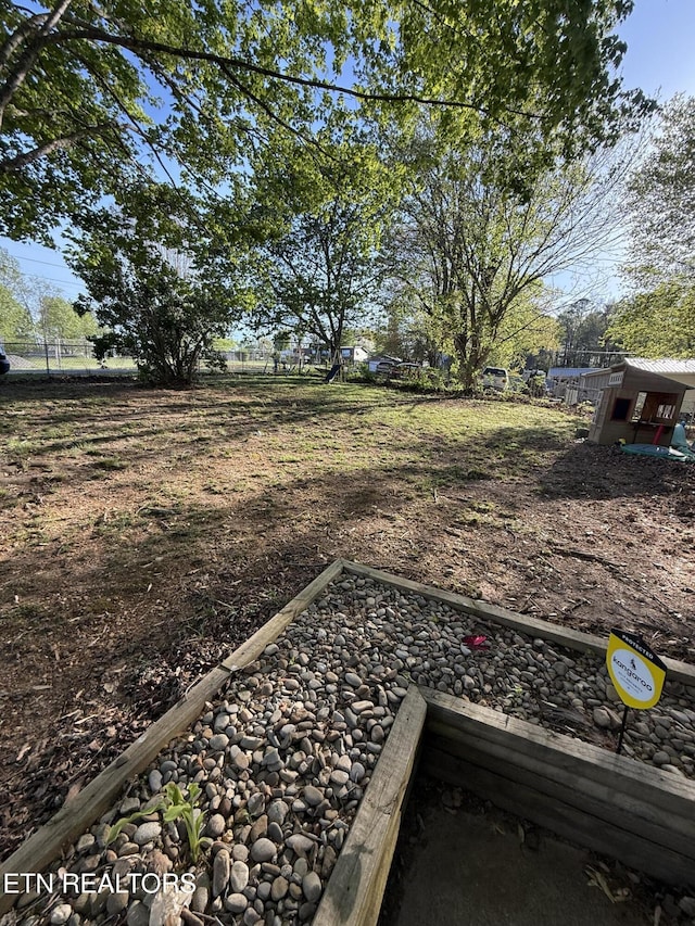 view of yard featuring fence