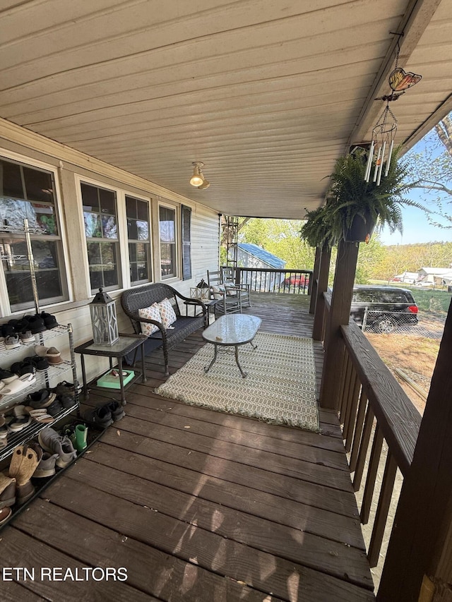 wooden deck with a porch