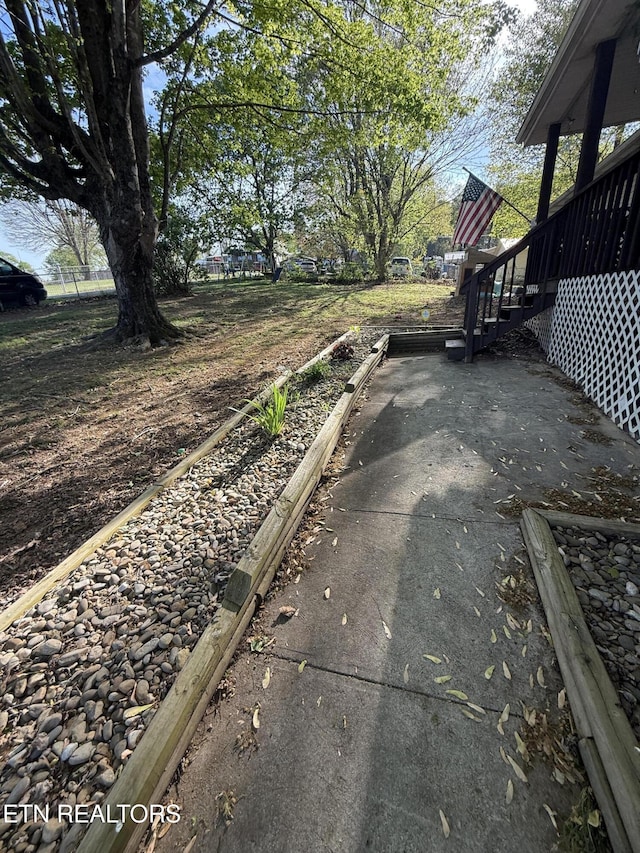 exterior space featuring a patio area and fence