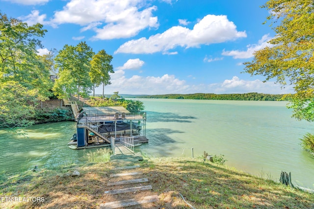 dock area with a water view