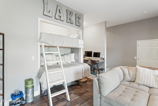 bedroom featuring wood finished floors