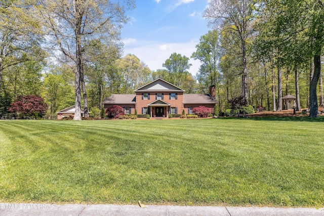 46 Chestnut Dr, Norris, TN 37828 - view of front of home with a front lawn