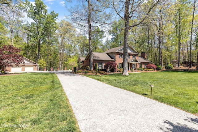 46 Chestnut Dr, Norris, TN 37828 - view of front of property featuring brick siding, driveway, and a front yard