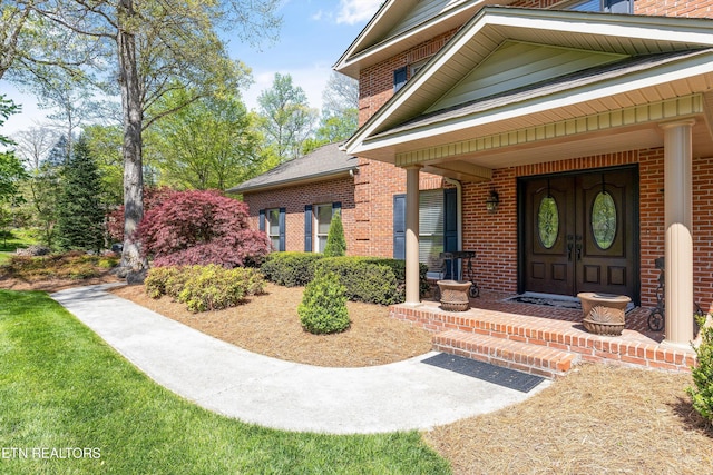 46 Chestnut Dr, Norris, TN 37828 - property entrance featuring brick siding and covered porch