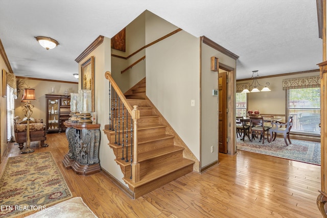 46 Chestnut Dr, Norris, TN 37828 - staircase with hardwood / wood-style flooring and ornamental molding