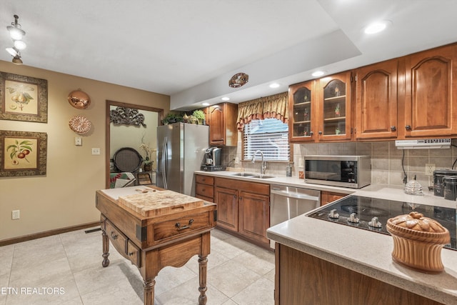 46 Chestnut Dr, Norris, TN 37828 - kitchen featuring stainless steel appliances, a sink, tasteful backsplash, recessed lighting, and light countertops