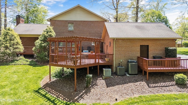 46 Chestnut Dr, Norris, TN 37828 - rear view of house with brick siding, central air condition unit, and a deck